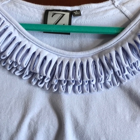 “Z” Sleeveless Ruffle Neck Blouse - Picture 6 of 6